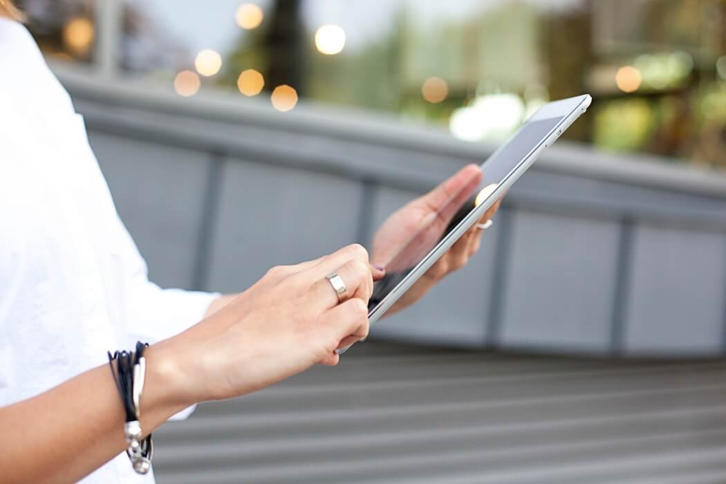 woman using Ai on tablet