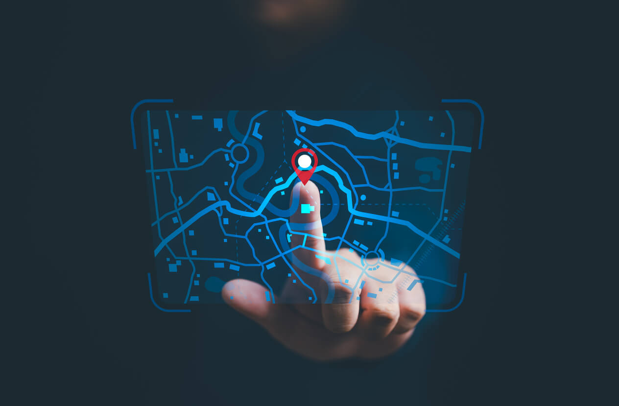 Businessman finger pin for location points and search addresses on the world map application. Marking destination for travel or finding business places in GPS Satellite coordinates system online web.